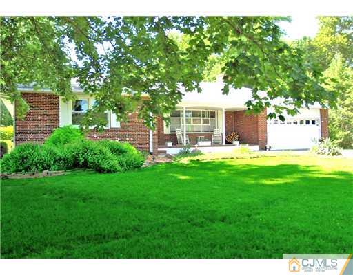 293 Friendship Road Cranbury, NJ 08512 - Photo 1 of 10 a view of a house with a yard porch and sitting area