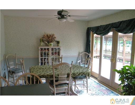 293 Friendship Road Cranbury, NJ 08512 - Photo 3 of 10 a view of a dining room with furniture and window
