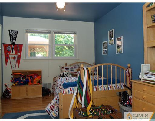 293 Friendship Road Cranbury, NJ 08512 - Photo 7 of 10 a view of a livingroom with furniture and a couch