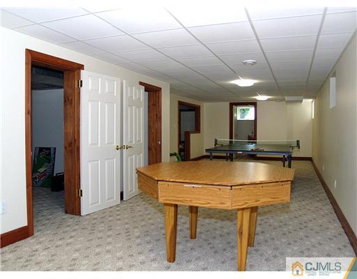 293 Friendship Road Cranbury, NJ 08512 - Photo 8 of 10 a room with table chairs and a rug