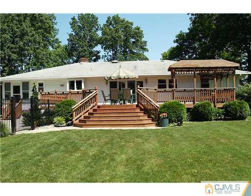 293 Friendship Road Cranbury, NJ 08512 - Photo 10 of 10 a front view of a house with a yard