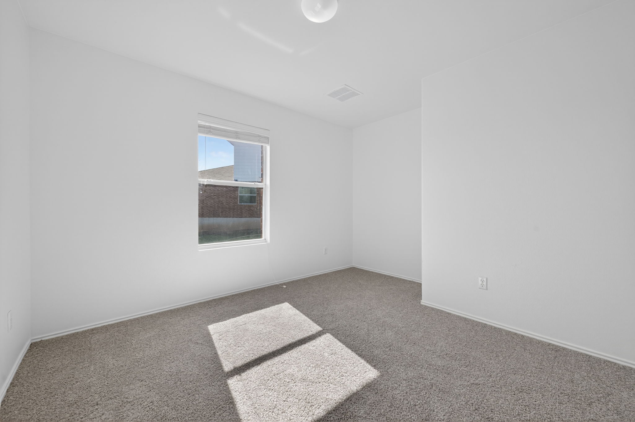 13629 Coomer Path Pflugerville, TX 78660 - Photo 17 of 30 Unfurnished room featuring baseboards and carpet