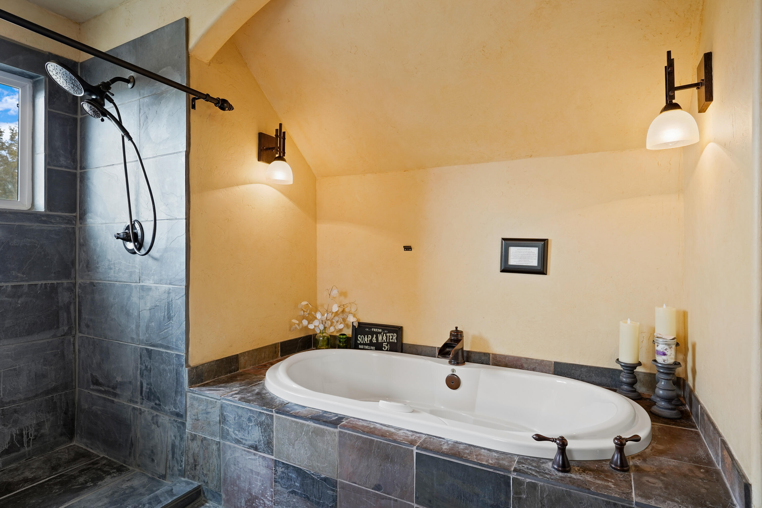 63520 Cricketwood Road Bend, OR 97701 - Photo 71 of 84 a bathroom with a tub and a sink