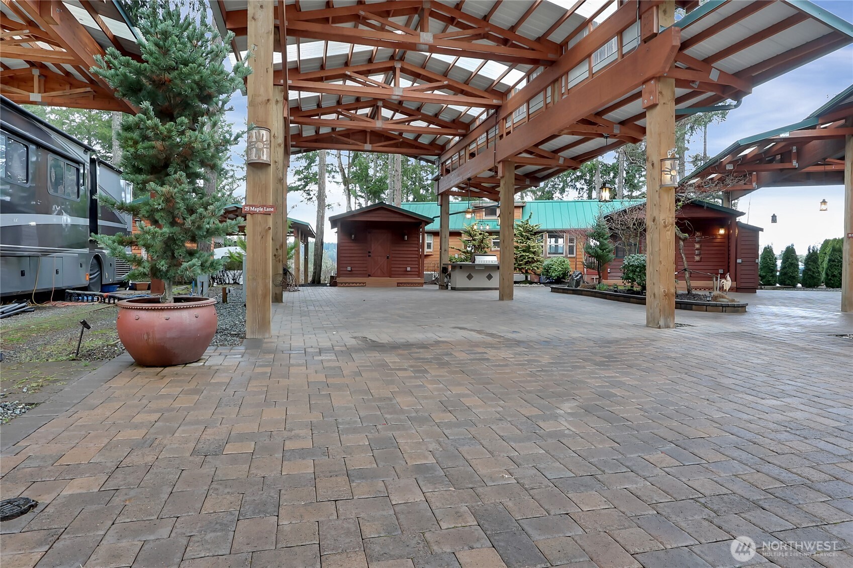 1546 Reservation Road Southeast, Unit 249 Olympia, WA 98513 - Photo 2 of 37 a view of a patio with table and chairs