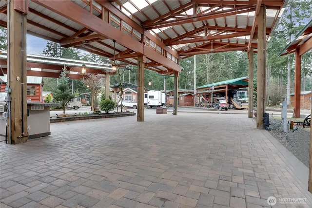 a view of parking garage with cars
