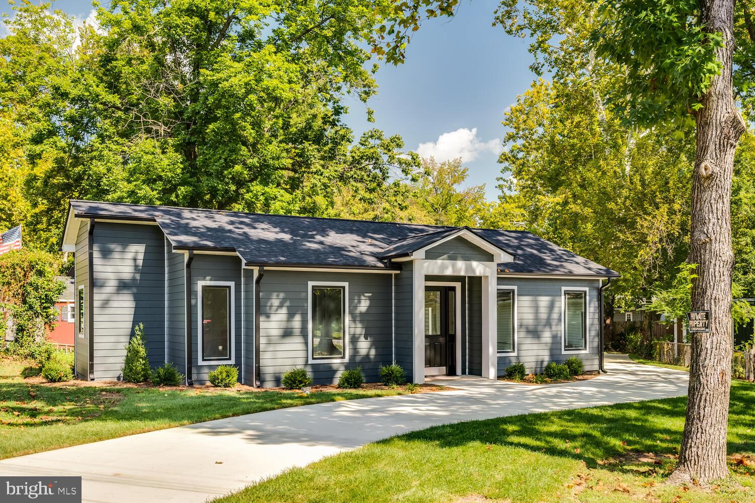 13711 Joyce Road Woodbridge, VA 22191 - Photo 2 of 54 front view of a house with a patio