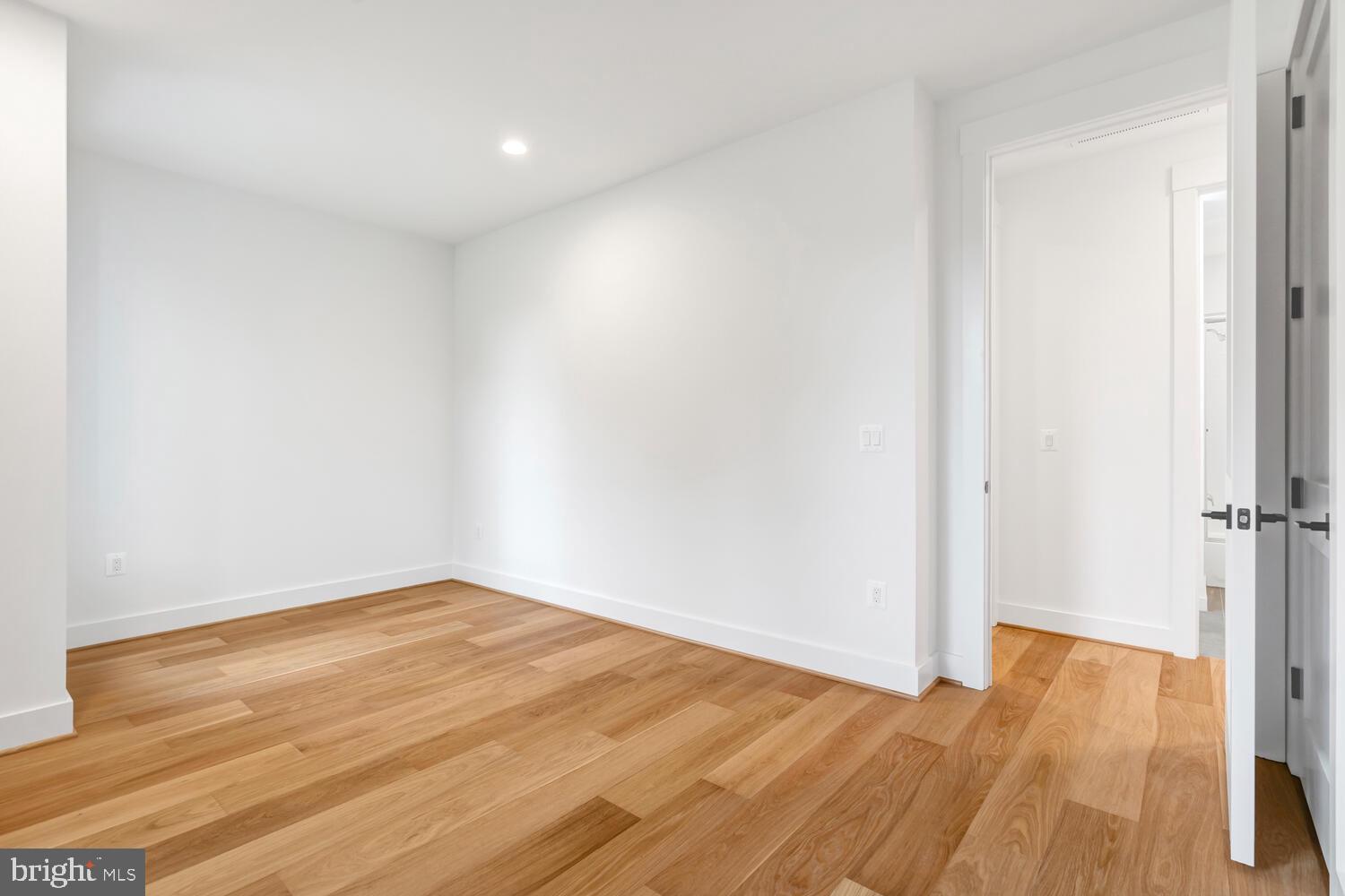 13711 Joyce Road Woodbridge, VA 22191 - Photo 25 of 54 a view of empty room with wooden floor