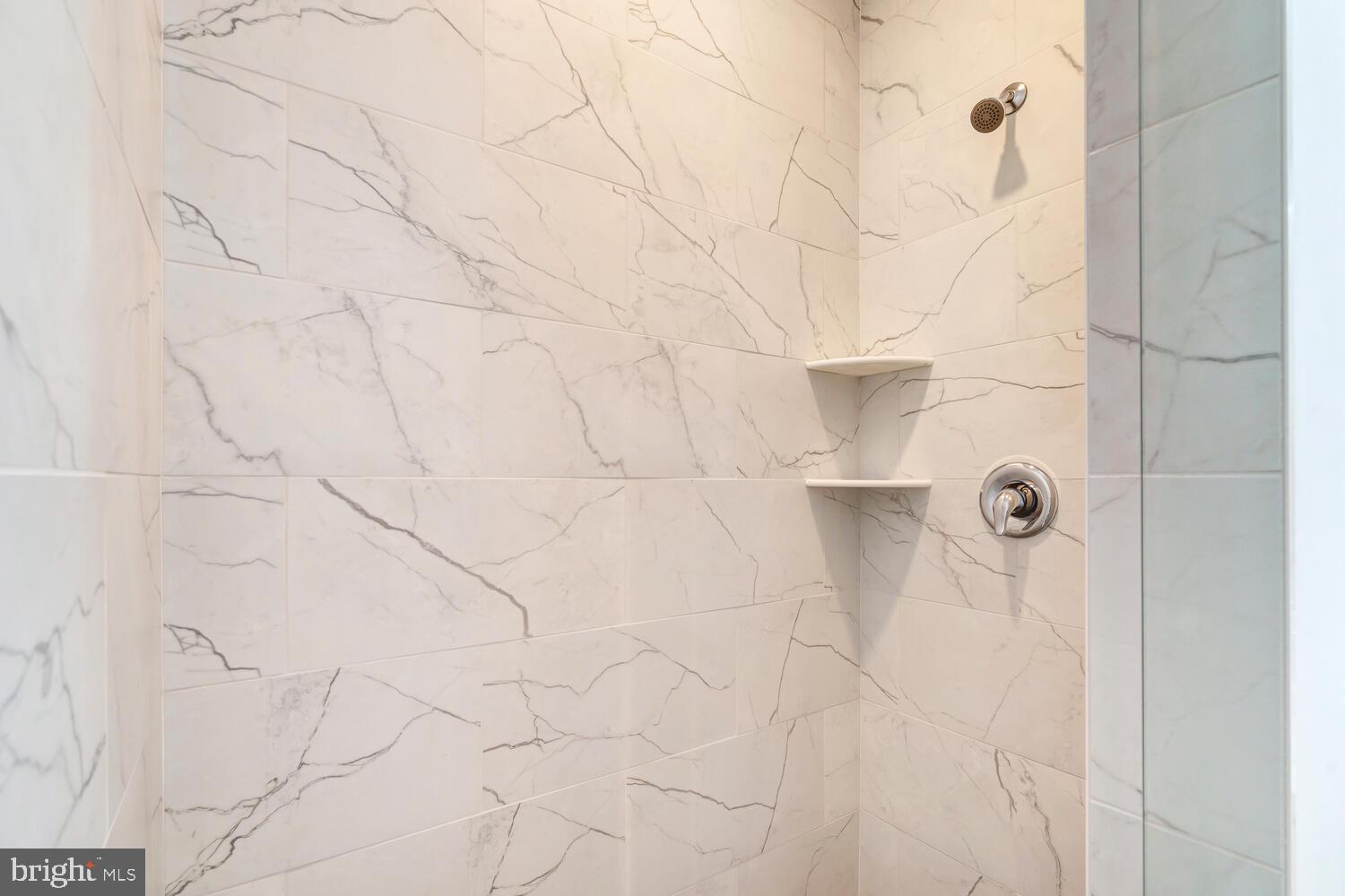 13711 Joyce Road Woodbridge, VA 22191 - Photo 26 of 54 a bathroom with a shower