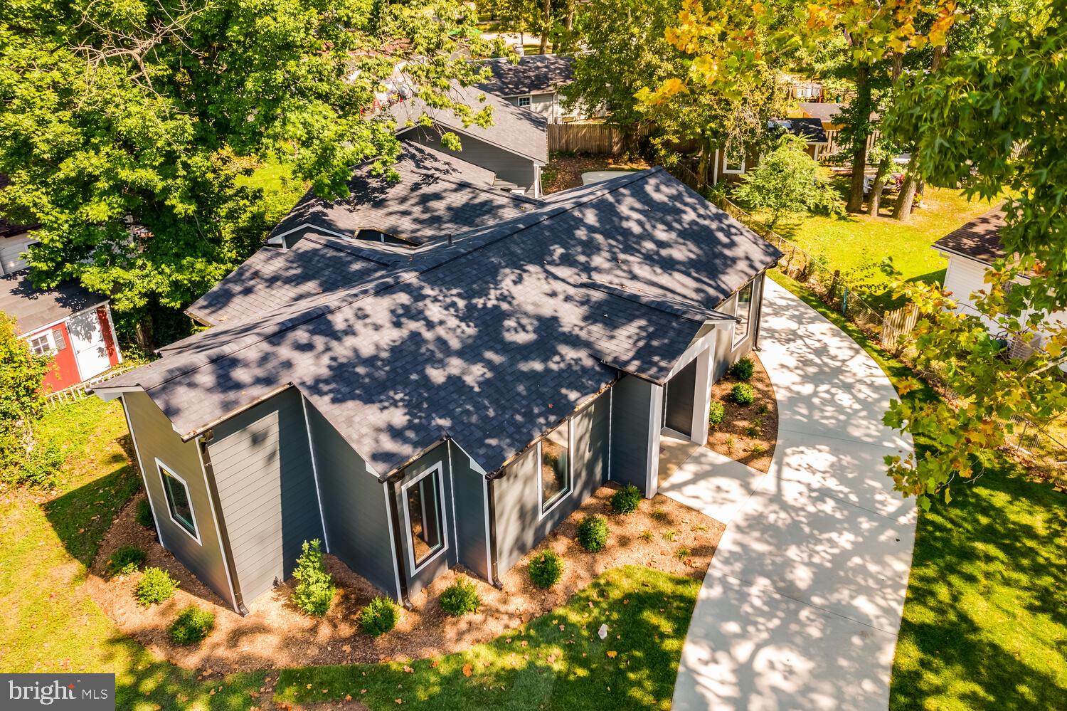 13711 Joyce Road Woodbridge, VA 22191 - Photo 3 of 54 a backyard of a house with lots of green space