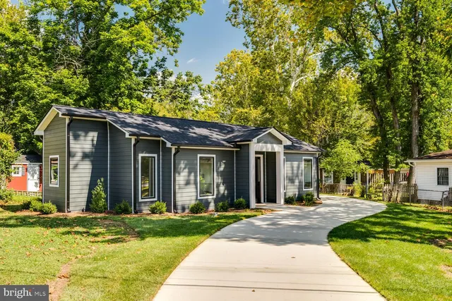 a view of a backyard with a small cabin