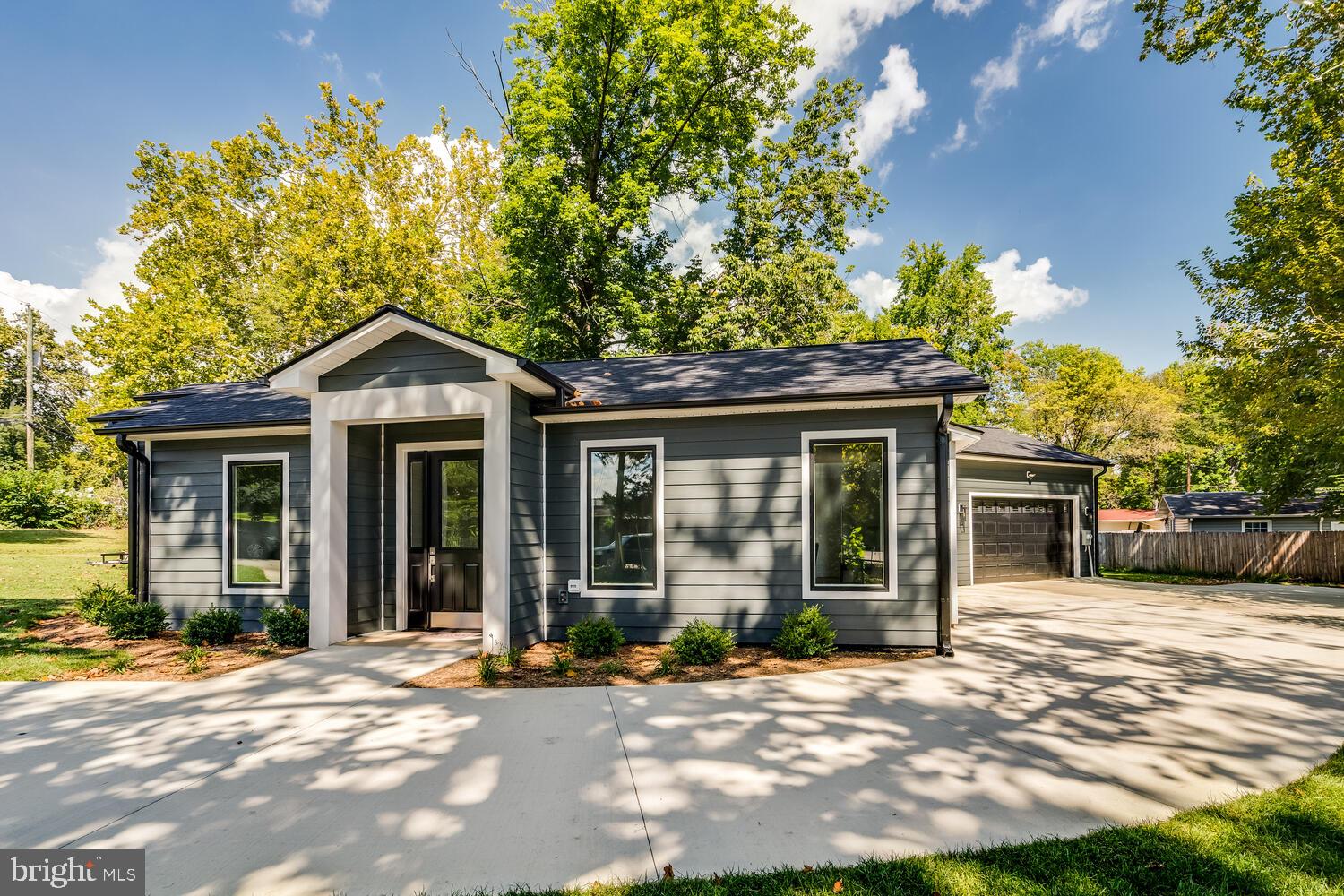 13711 Joyce Road Woodbridge, VA 22191 - Photo 41 of 54 a front view of a house with a yard