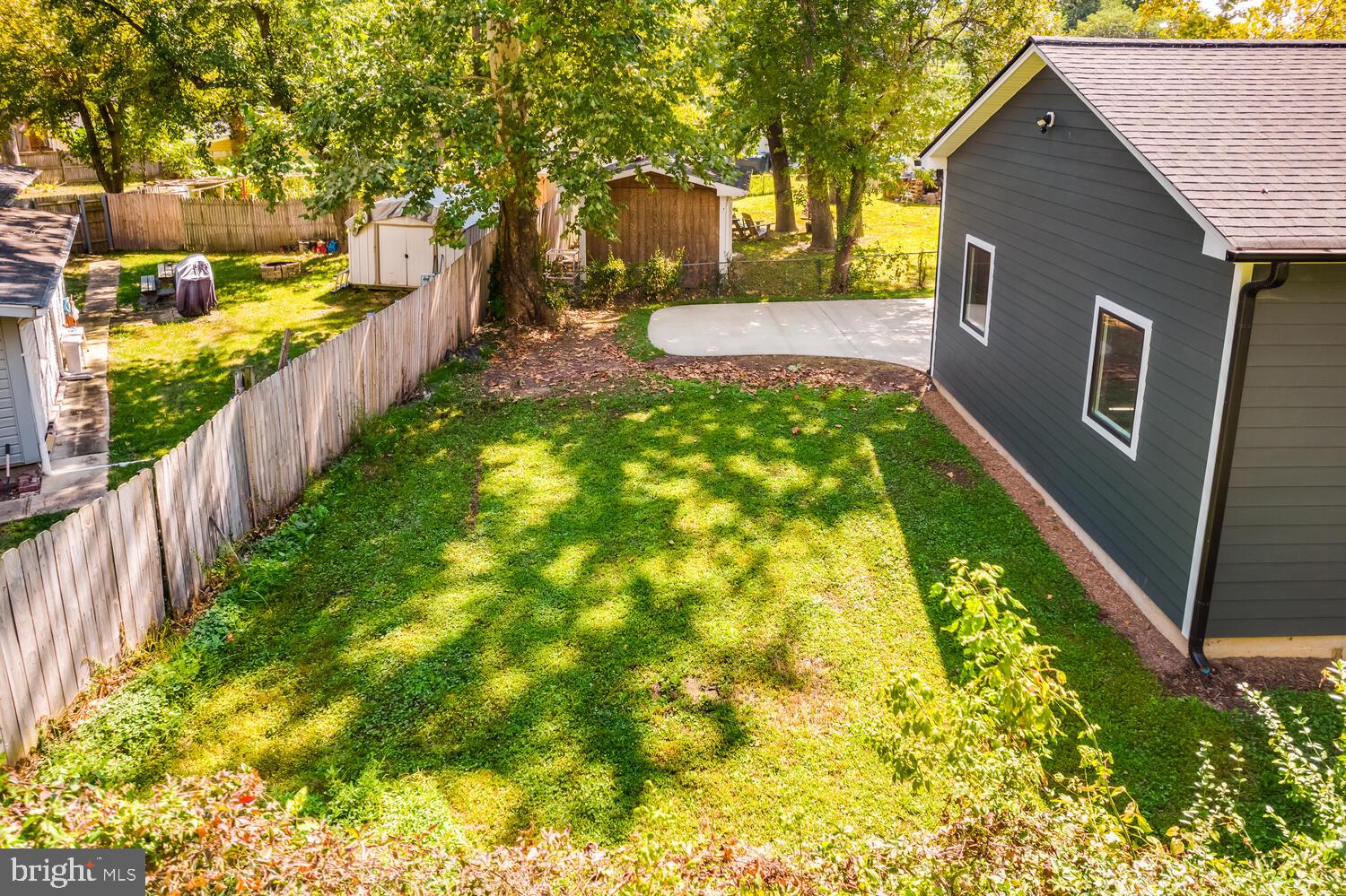 13711 Joyce Road Woodbridge, VA 22191 - Photo 51 of 54 a view of an house with backyard