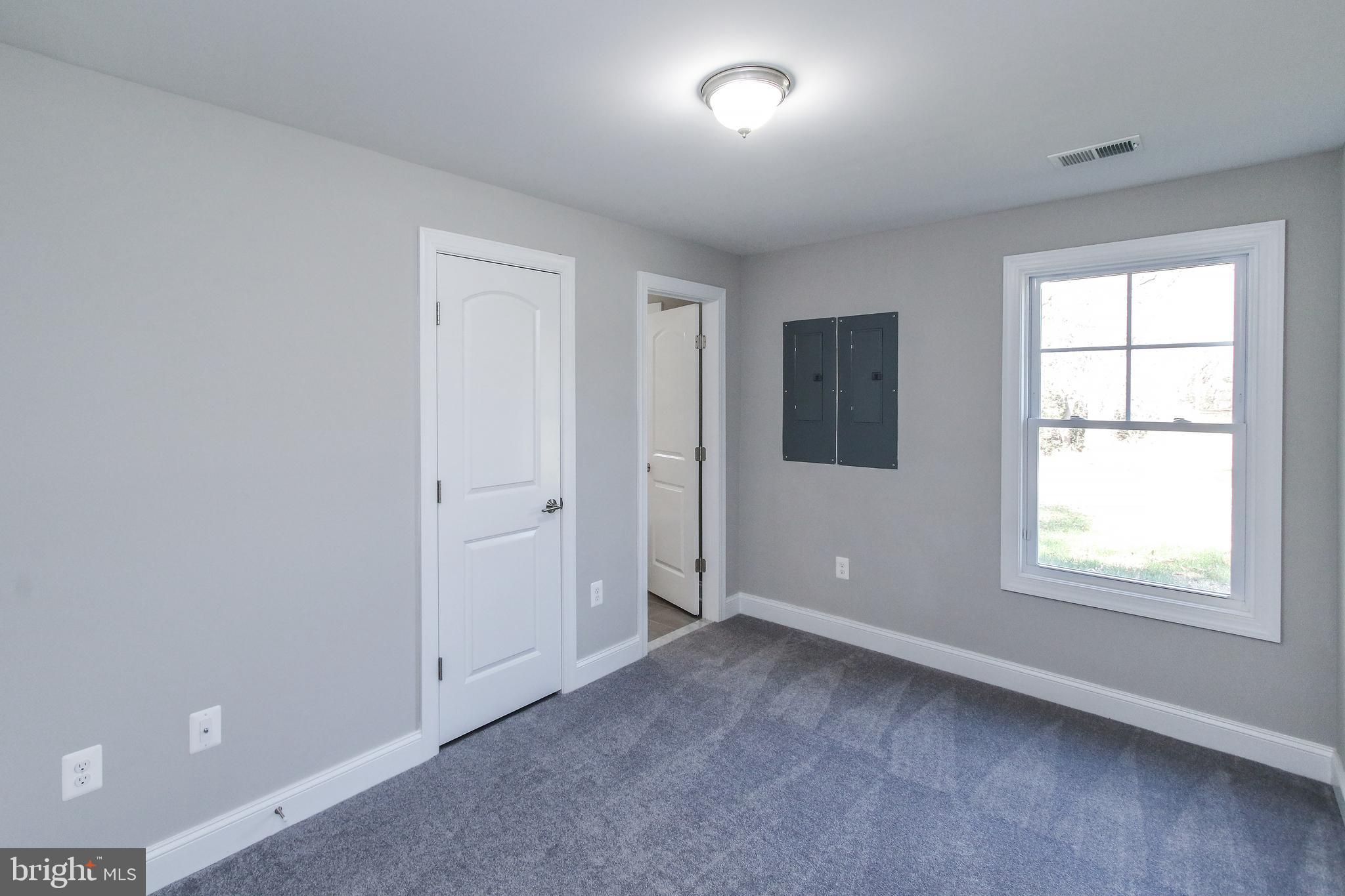 262 Bayard Road Lothian, MD 20711 - Photo 26 of 64 Bedroom with full bath and laundry hookup