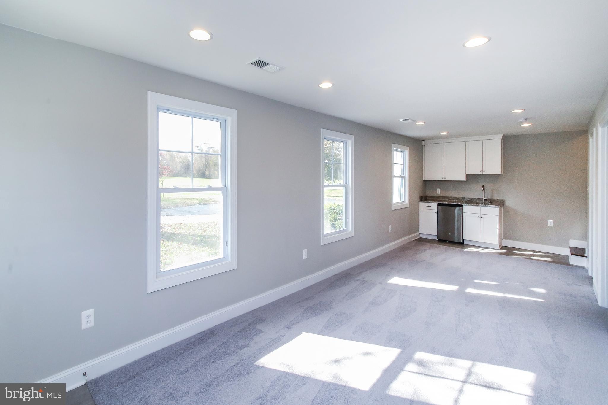 262 Bayard Road Lothian, MD 20711 - Photo 32 of 64 Lower level Finished area, w/ wet bar