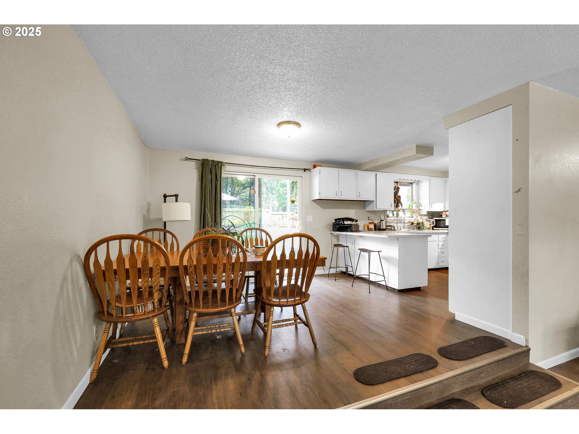 910 East 43rd Avenue Eugene, OR 97405 - Photo 17 of 47 a dining room with furniture and wooden floor
