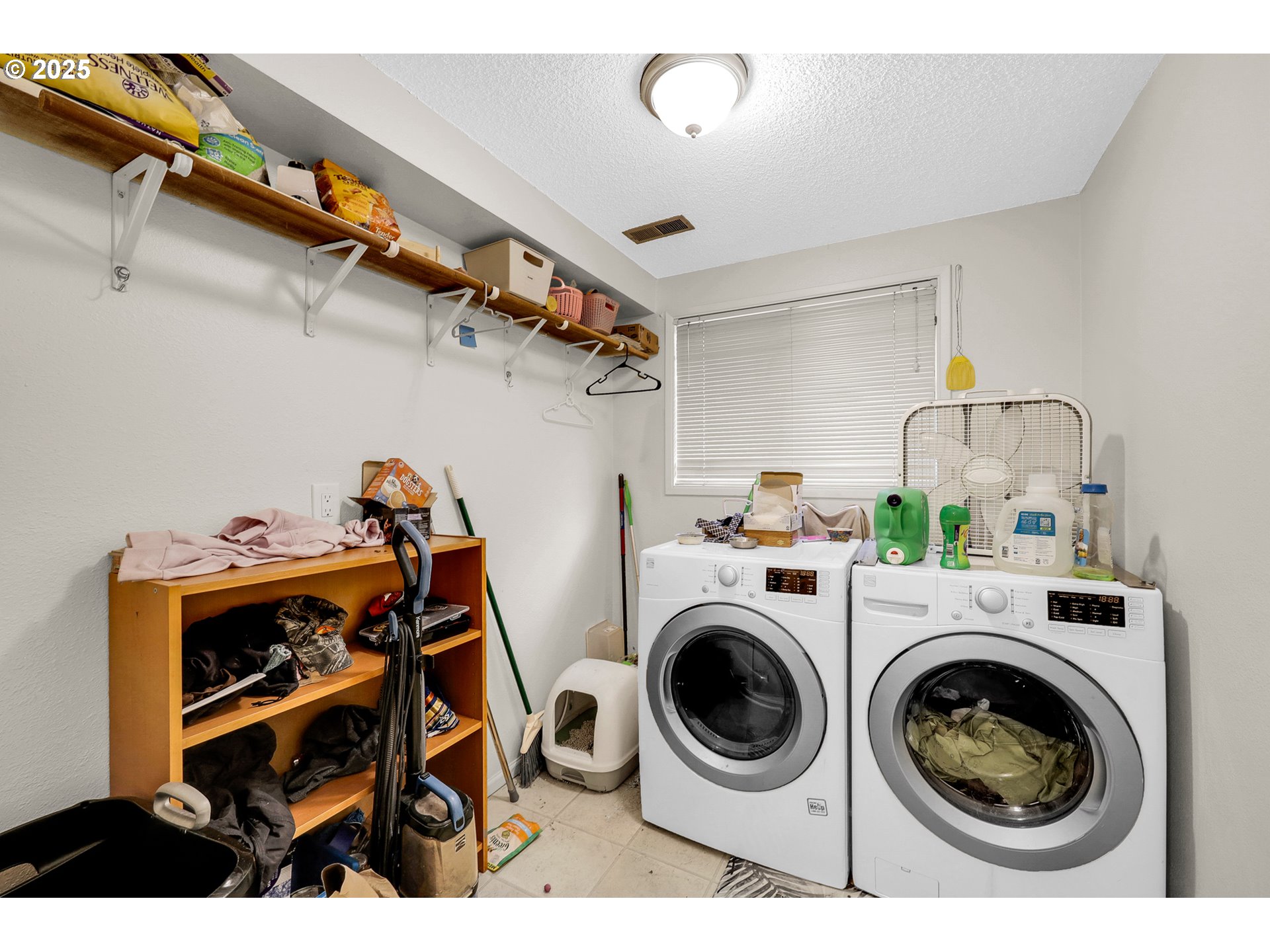 910 East 43rd Avenue Eugene, OR 97405 - Photo 26 of 47 a utility room with sink dryer and washer
