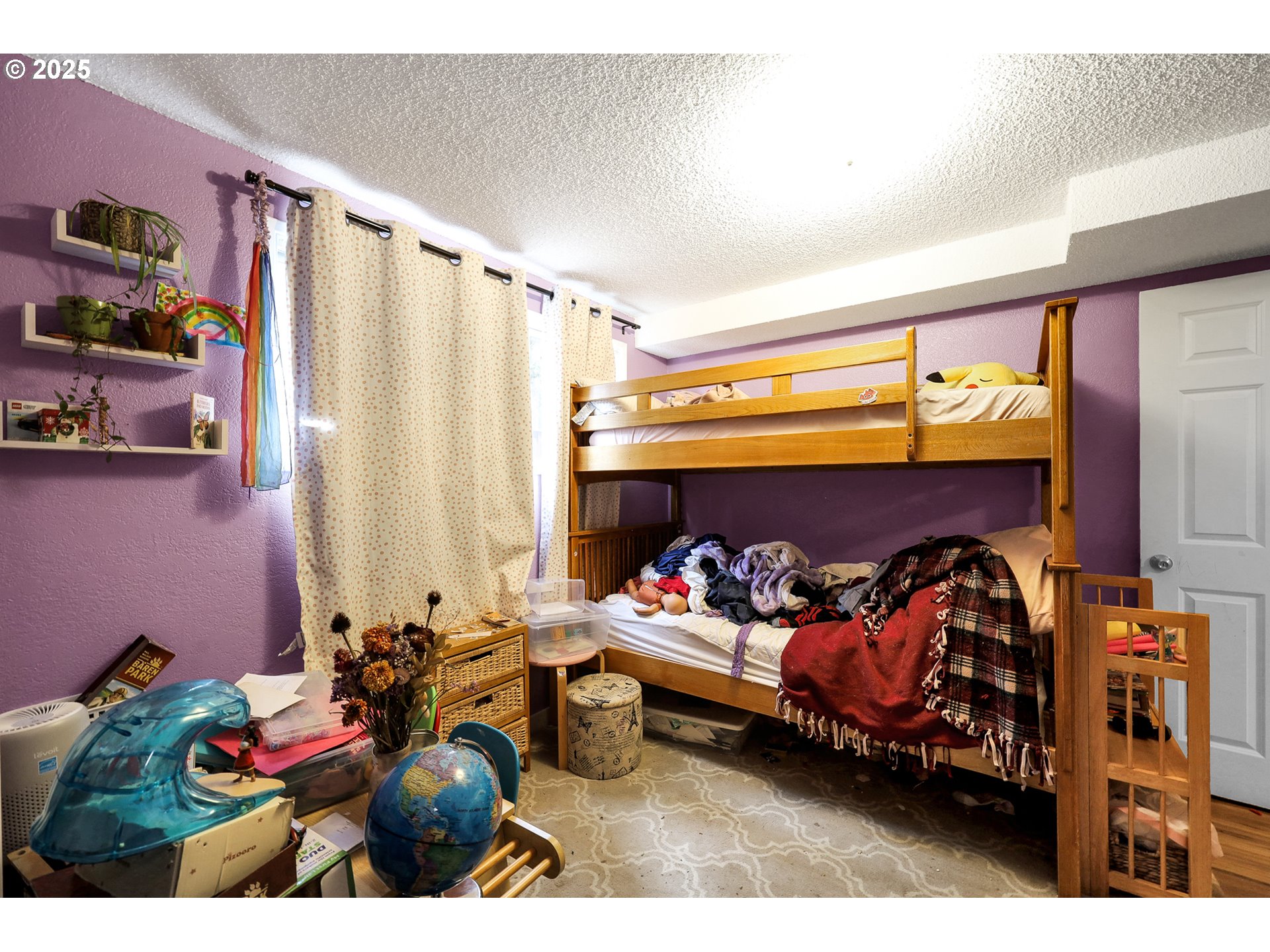 910 East 43rd Avenue Eugene, OR 97405 - Photo 30 of 47 a bedroom with furniture and a bed