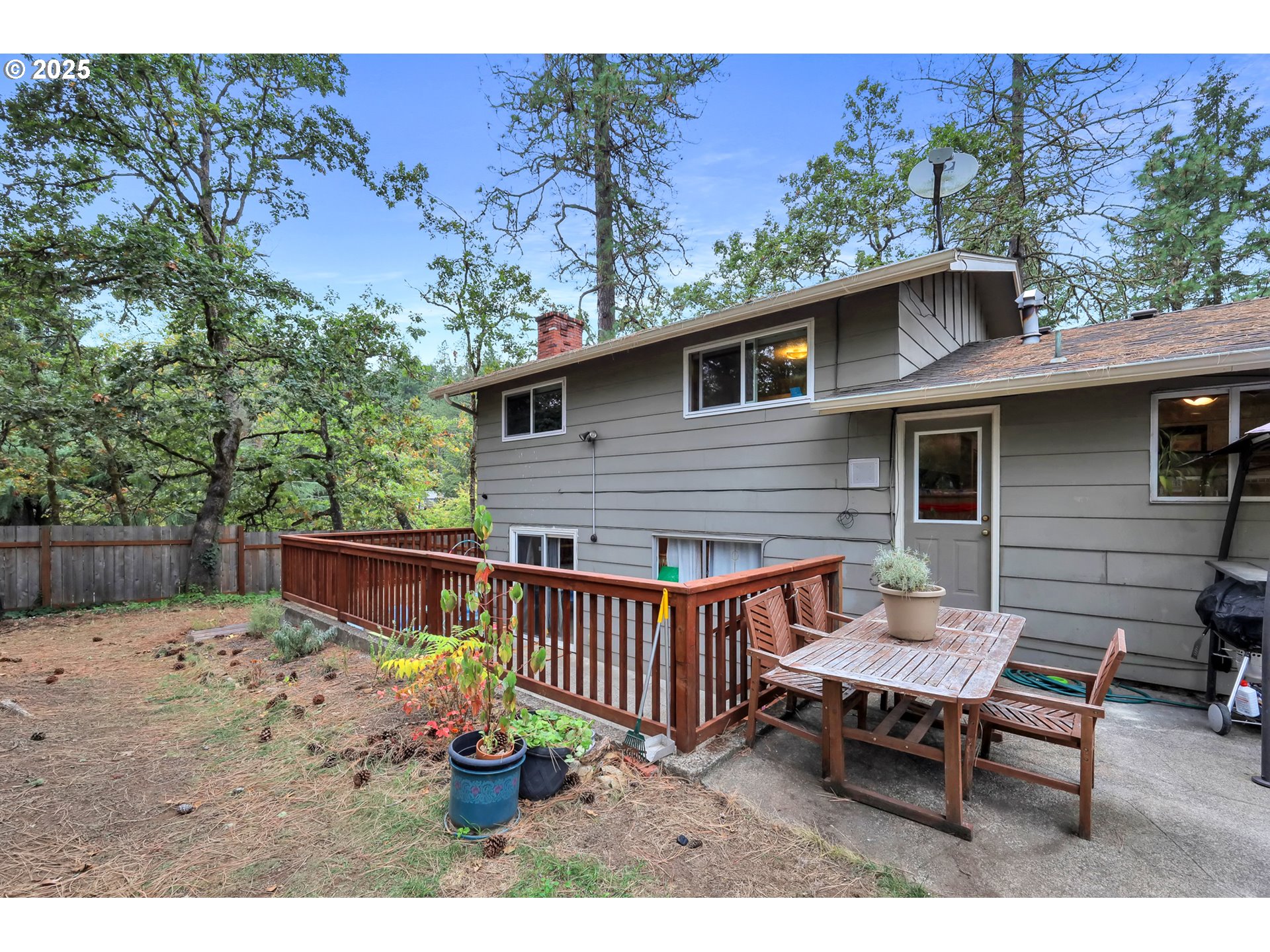 910 East 43rd Avenue Eugene, OR 97405 - Photo 43 of 47 a view of a patio with a table and chairs