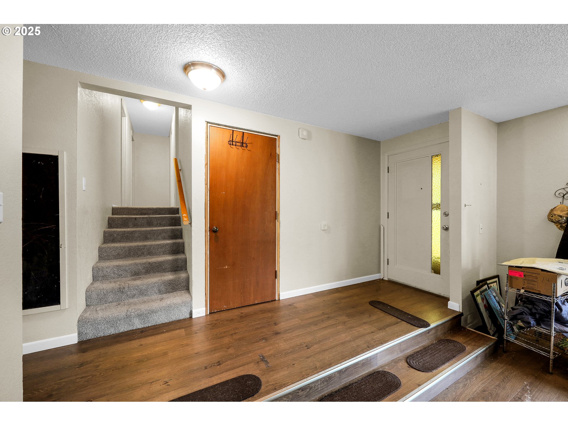 910 East 43rd Avenue Eugene, OR 97405 - Photo 6 of 47 a view of an empty room and wooden floor
