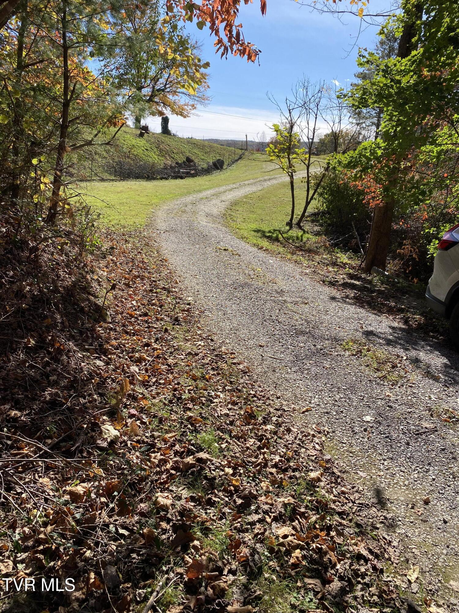 12329 Crab Orchard Road Coeburn, VA 24230 - Photo 4 of 36 Follow the road