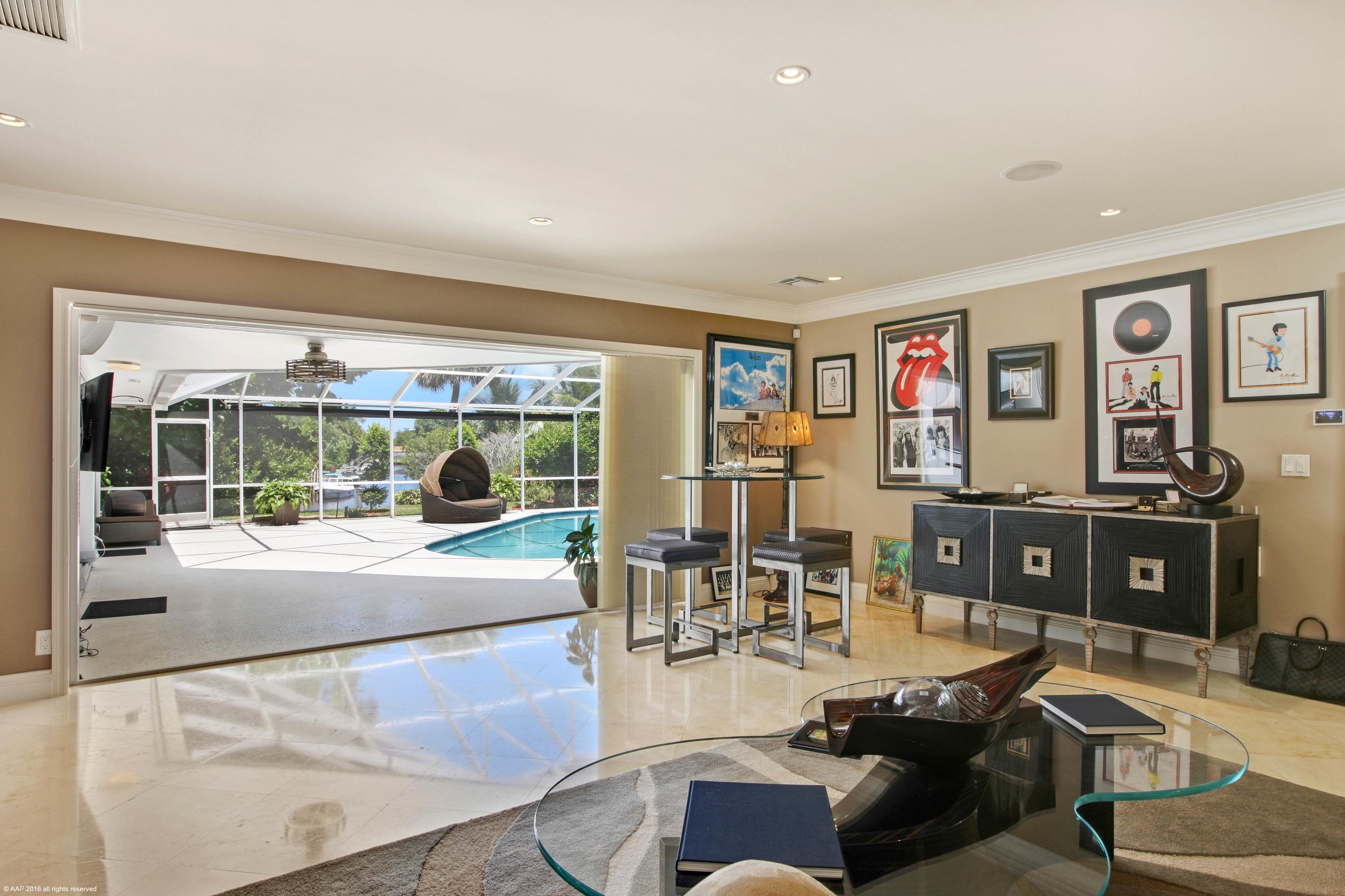 1216 Mulberry Way Boca Raton, FL 33486 - Photo 10 of 38 FAMILY ROOM TRIPLE SLIDER TO POOL