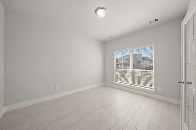 an empty room with windows