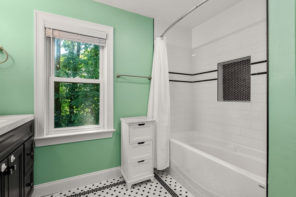 68 Prospect Street Canton, MA 02021 - Photo 21 of 28 a bathroom with a bathtub and a shower