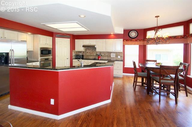 12268 Stanley Canyon Road Colorado Springs, CO 80921 - Photo 12 of 36 Kitchen / Breakfast Nook