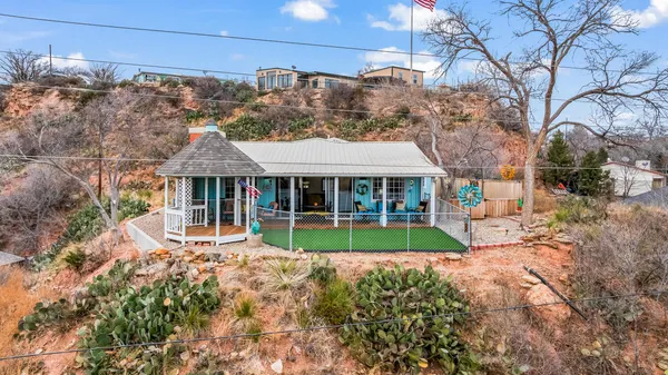 a view of house with outdoor space and porch