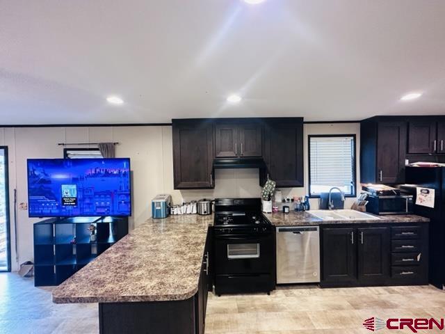 62880 Lasalle Road, Unit 185 Montrose, CO 81401 - Photo 3 of 19 a kitchen with granite countertop lots of counter top space