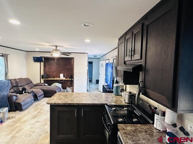 62880 Lasalle Road, Unit 185 Montrose, CO 81401 - Photo 5 of 19 a kitchen with counter top space and appliances