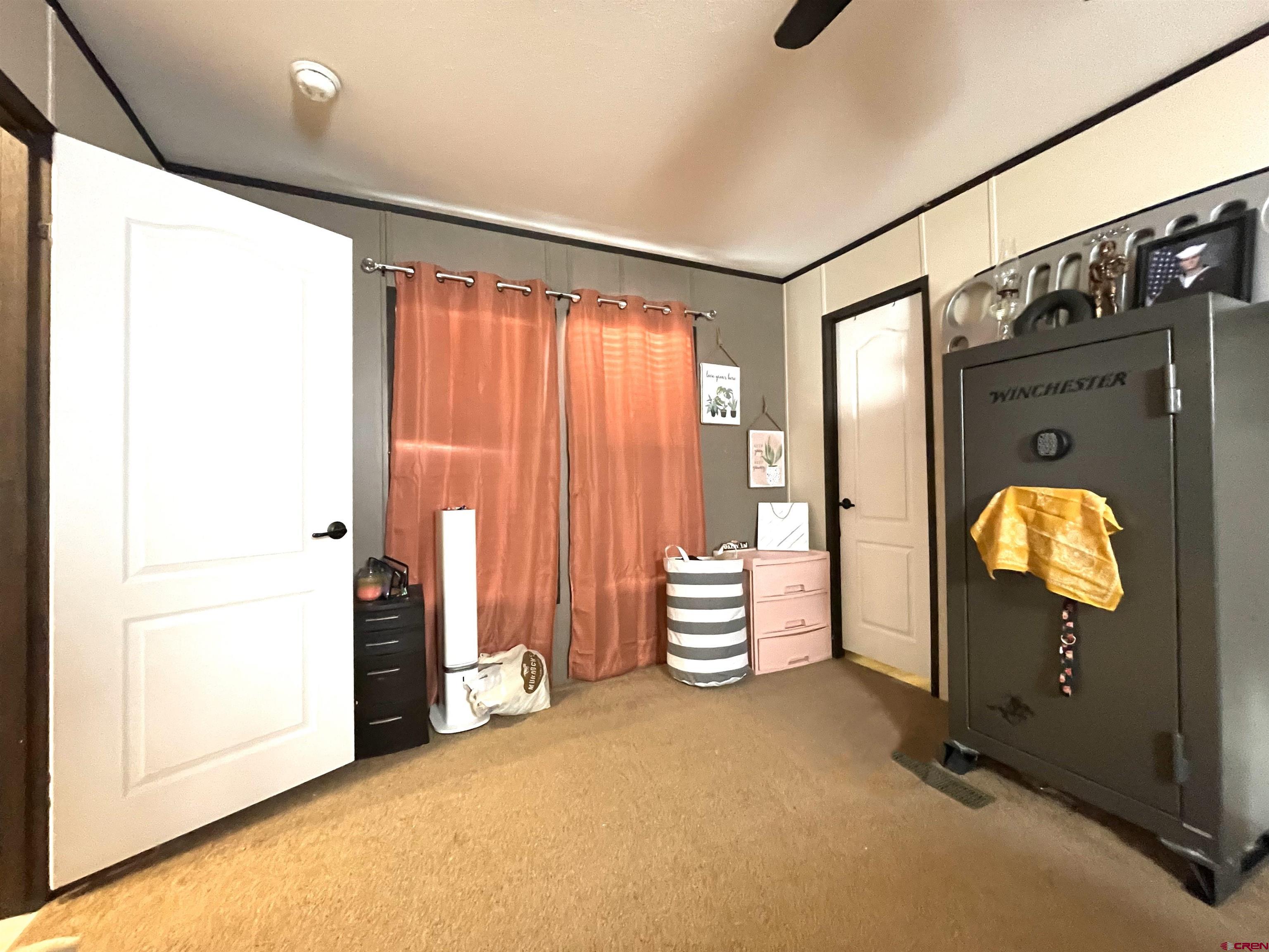 62880 Lasalle Road, Unit 185 Montrose, CO 81401 - Photo 7 of 19 a view of room with window and bathroom