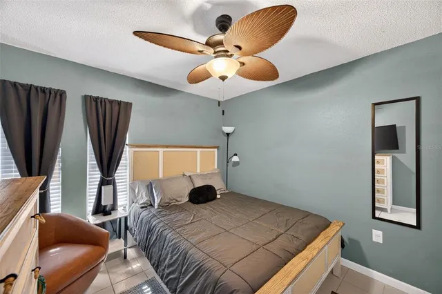 a bathroom with a shower and a mirror