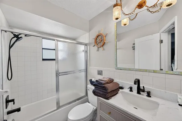 a swimming pool with outdoor seating yard and patio