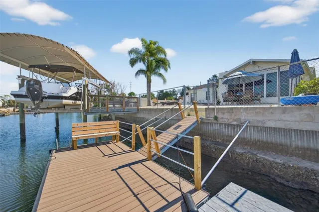 a view of a house with a yard and a garage