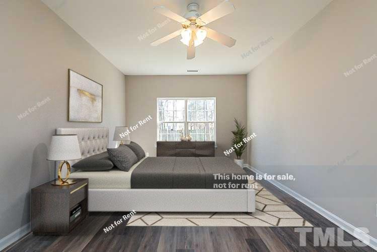 5304 Neuse Forest Road Raleigh, NC 27616 - Photo 3 of 26 a living room with furniture and a window
