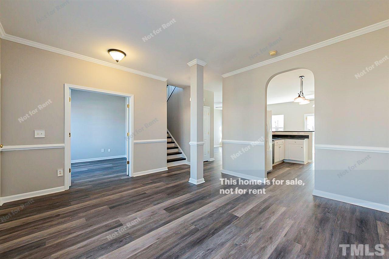 5304 Neuse Forest Road Raleigh, NC 27616 - Photo 10 of 26 wooden floor in an empty room with wooden floor