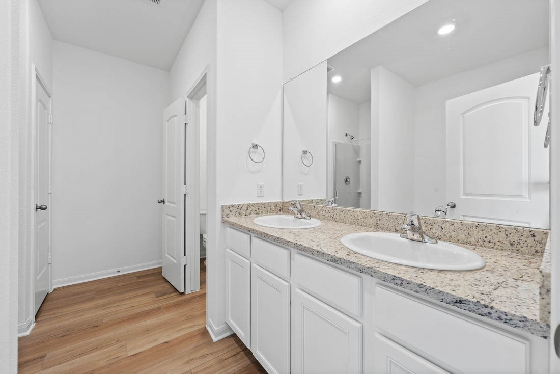 109 McLintock Road Jarrell, TX 76537 - Photo 5 of 8 a bathroom with a sink and a mirror