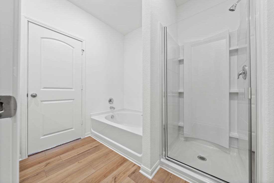 109 McLintock Road Jarrell, TX 76537 - Photo 6 of 8 a bathroom with a bathtub and a shower