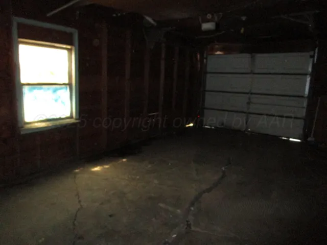 a house view with a backyard space