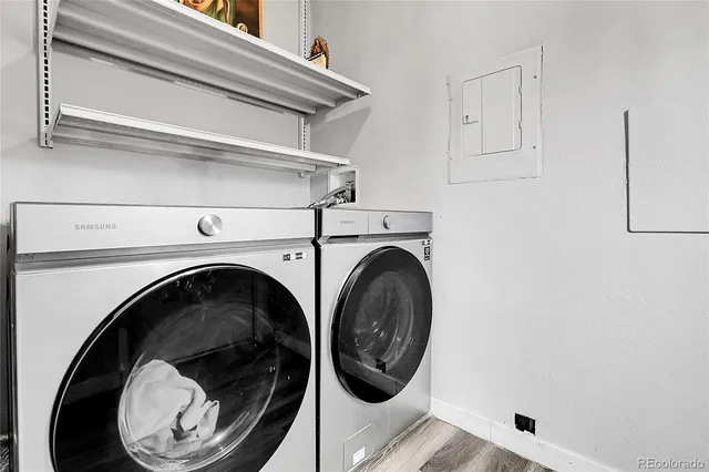 a close view of a washer and dryer in a utility room