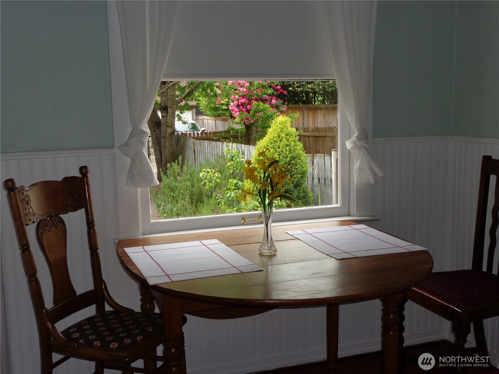 1639 22nd Avenue Longview, WA 98632 - Photo 12 of 35 a view of a dining room with furniture and window