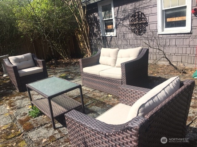 1639 22nd Avenue Longview, WA 98632 - Photo 30 of 35 a view of backyard with a table and chairs
