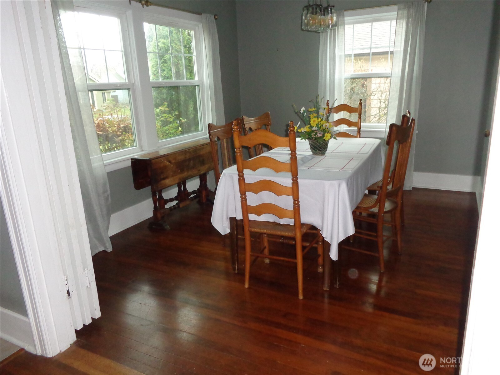 1639 22nd Avenue Longview, WA 98632 - Photo 7 of 35 a dining room with furniture window wooden floor