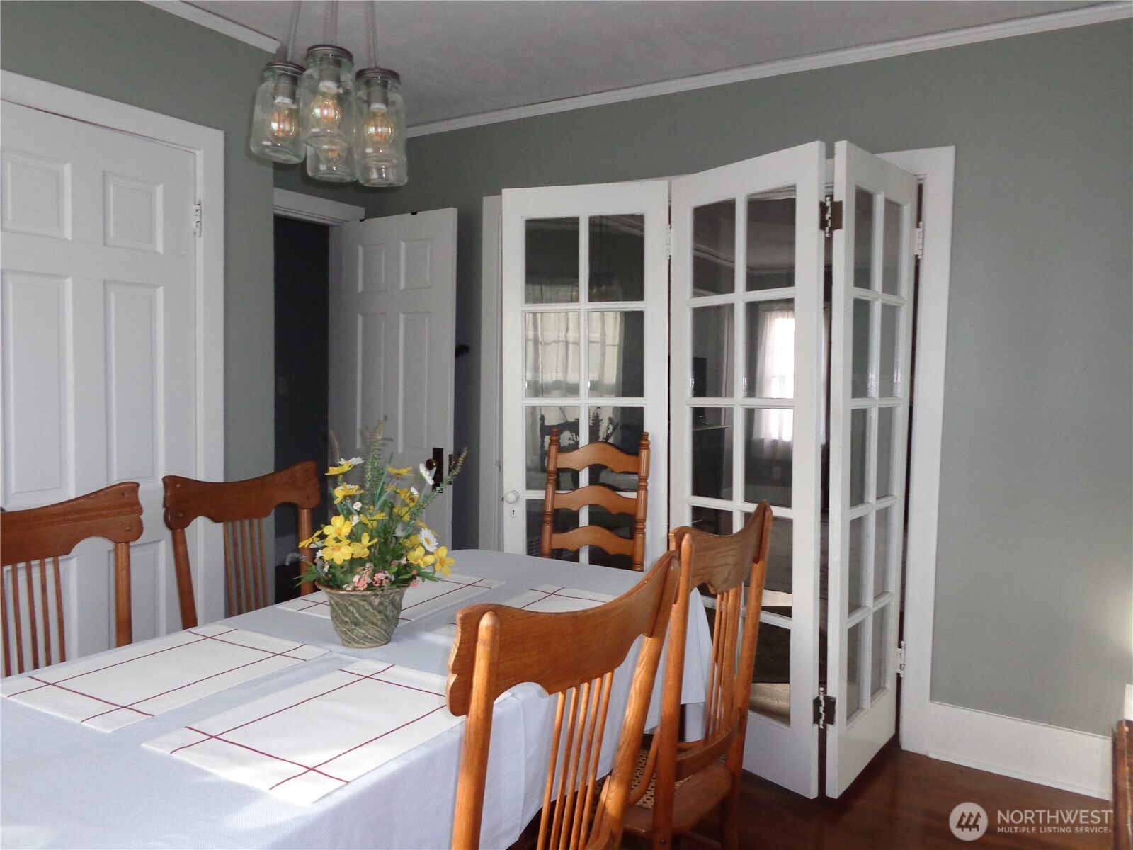 1639 22nd Avenue Longview, WA 98632 - Photo 8 of 35 a view of a dining room with furniture and chandelier