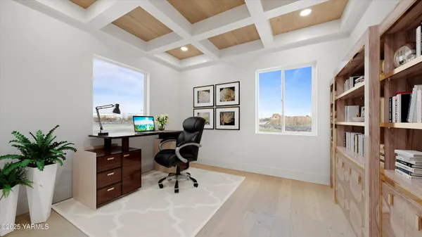 a view of a workspace with furniture and a potted plant
