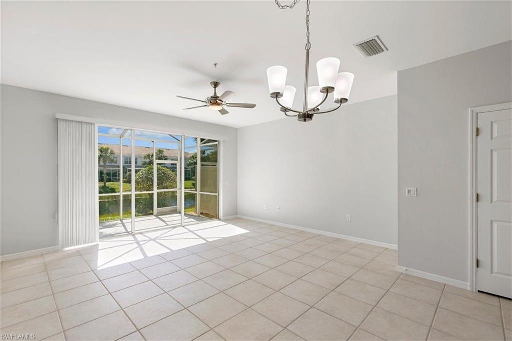 839 Hampton Circle, Unit 149 Naples, FL 34105 - Photo 3 of 22 a view of an empty room with a window