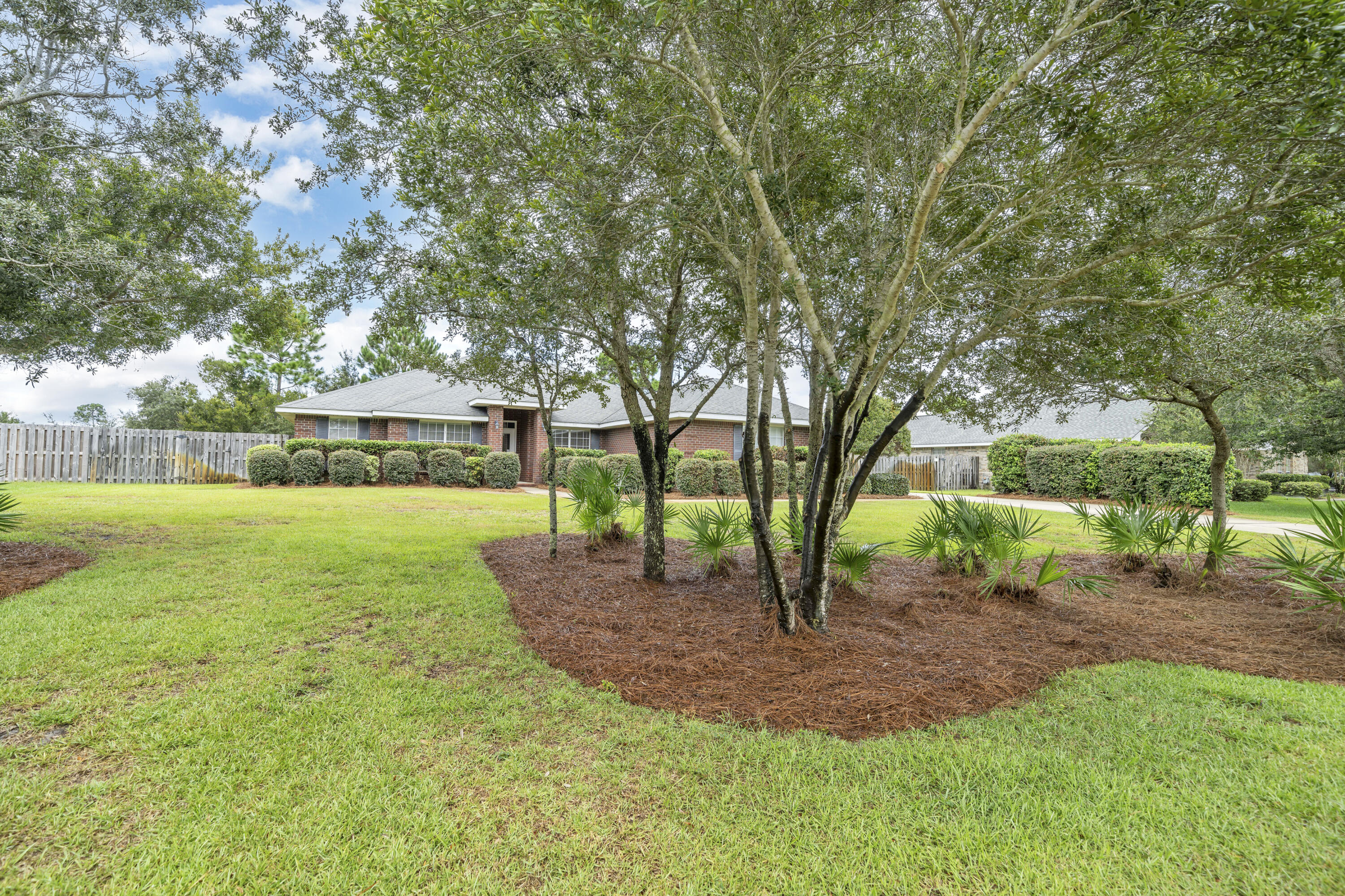 227 East Shipwreck Road Santa Rosa Beach, FL 32459 - Photo 1 of 39 a view of a house with a backyard
