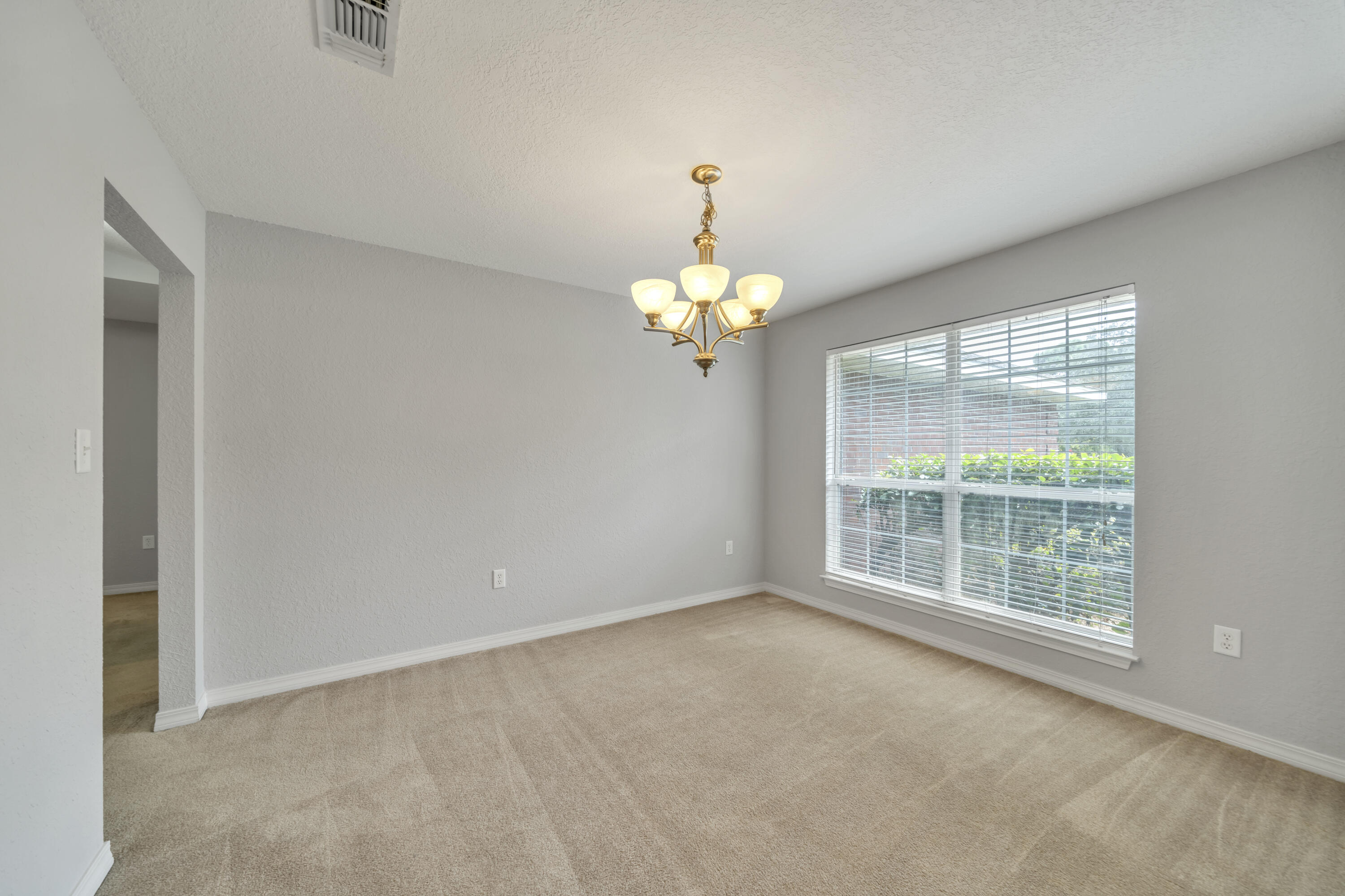 227 East Shipwreck Road Santa Rosa Beach, FL 32459 - Photo 5 of 39 a view of an empty room with a window
