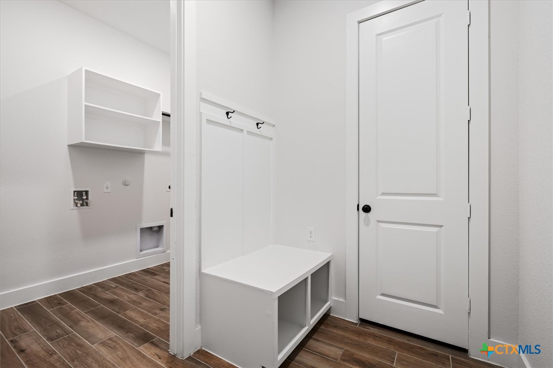 412 Pin Cherry Pass San Marcos, TX 78666 - Photo 26 of 47 a view of a kitchen from the hallway